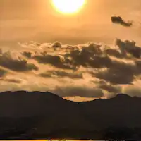 วิวพระอาทิตย์ตกที่เซโตะจากชายหาดตะวันตกของมิยาจิมะ