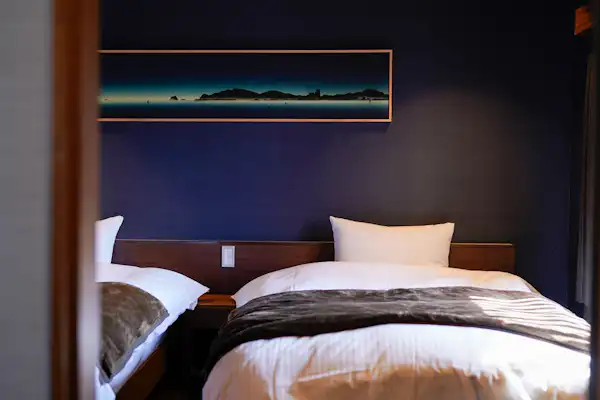 เตียงในห้องพักสไตล์ตะวันตก