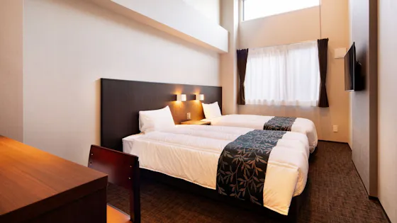 Bilik kembar kira-kira 15 meter persegi