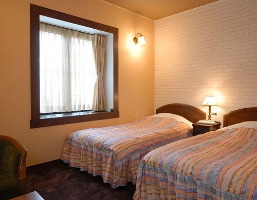 和洋室。洋室ベッドルーム８畳。