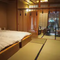 8 tatami + 6 tatami (with Japanese-style bed) + 4 tatami veranda