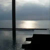 Beyond the Onsen's large bath lies the vast ocean