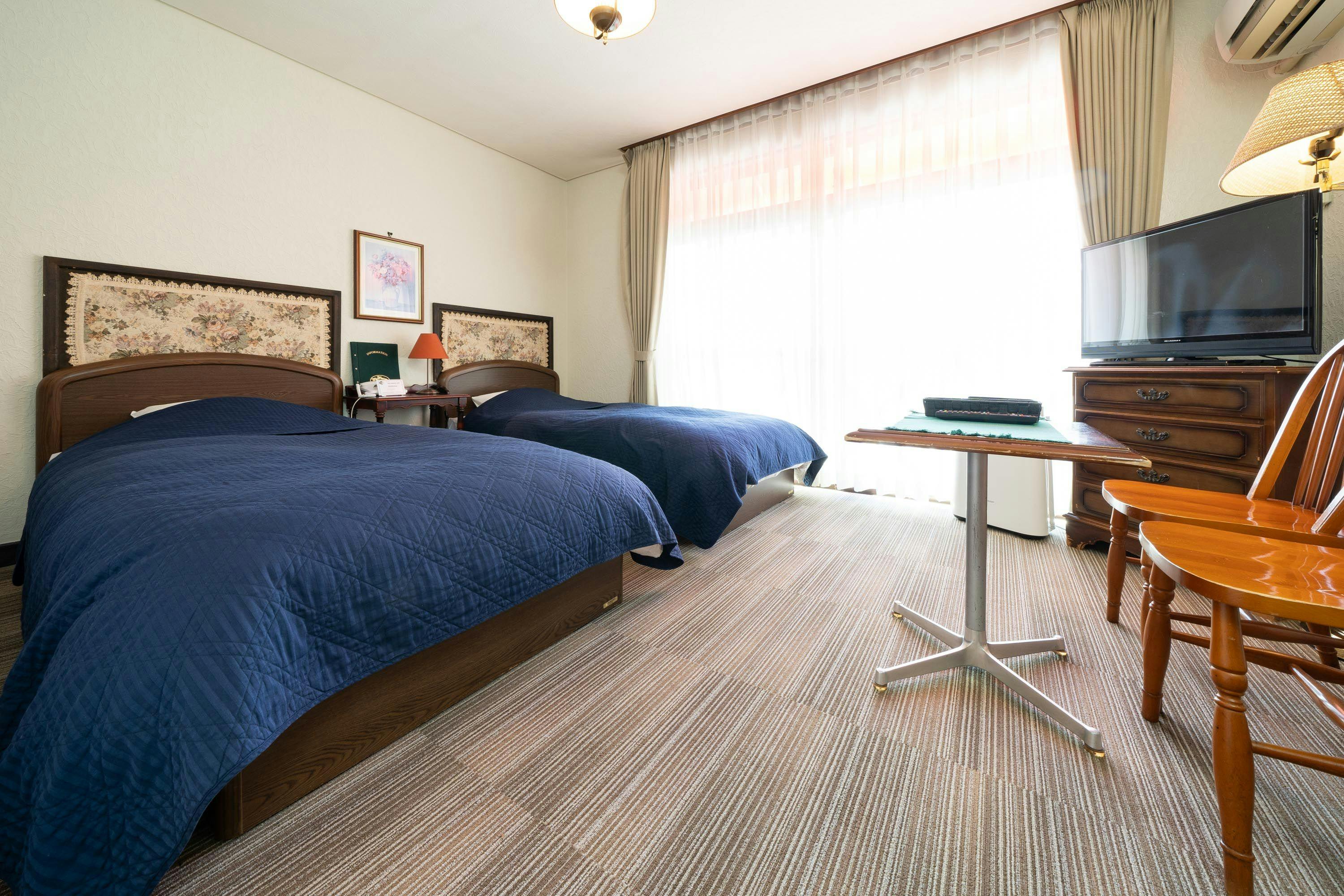 這是本館的雙床房。