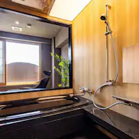 半露天の趣を愉しむ温泉付客室