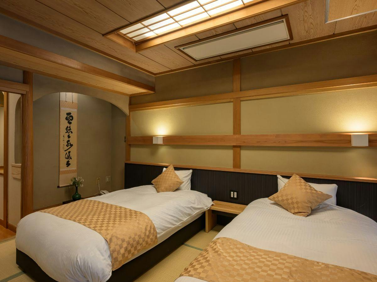 和の趣に包まれて休む心安らぐツインベッド