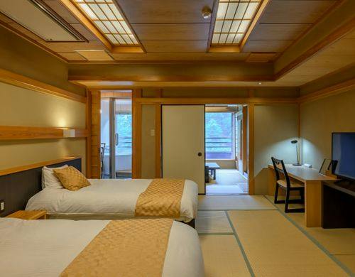 和の趣に包まれて休む心安らぐツインベッド