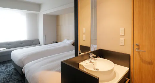 ห้องเตียงคู่พร้อมอ่างอาบน้ำ เหมาะสำหรับครอบครัว