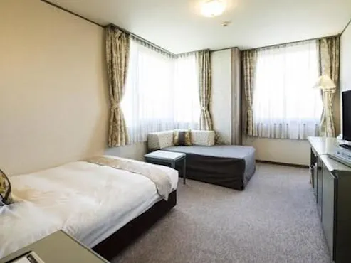 Contoh kamar: Kamar dengan tempat tidur ganda