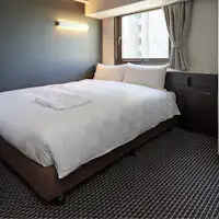 ห้องพักเตียงคู่ปลอดบุหรี่ 13~15 ตร.ม. เตียงคู่ 1 เตียง ขนาด 140 ซม.