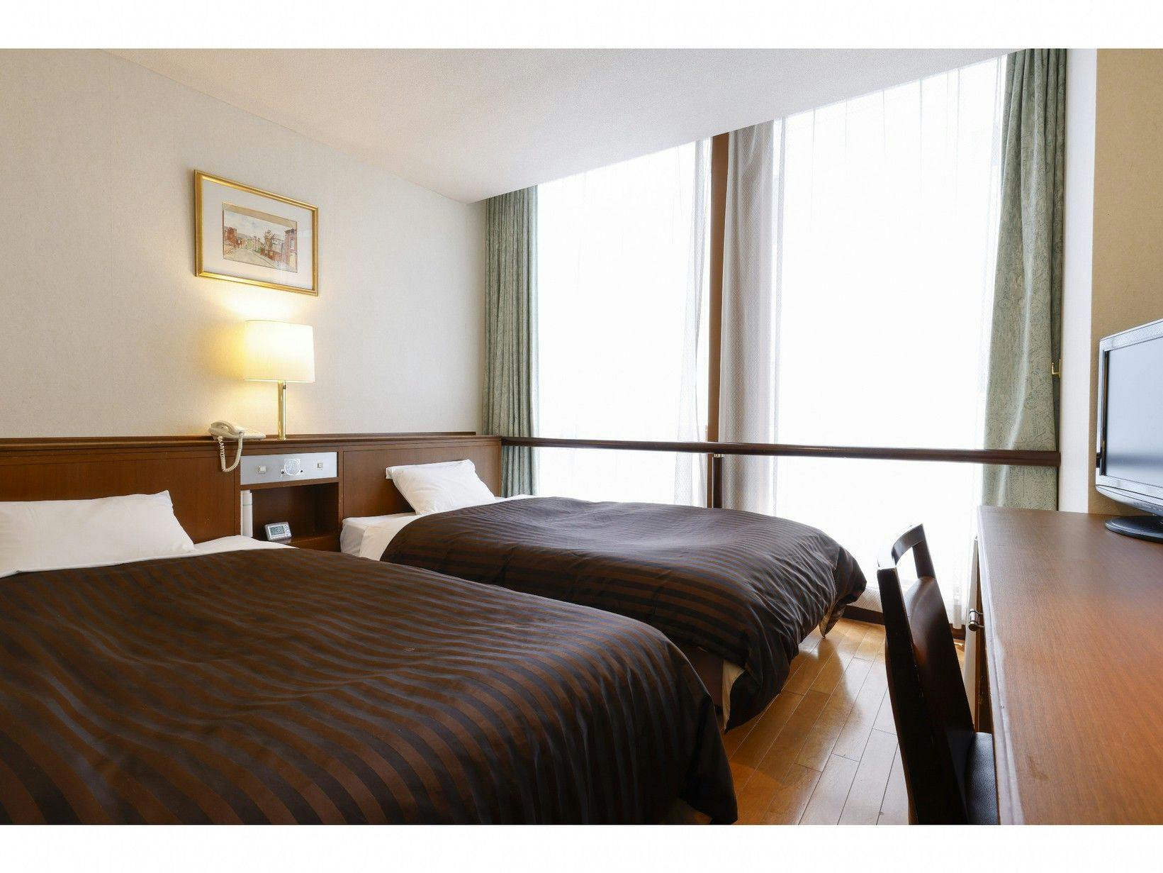 ห้องทวินปลอดบุหรี่ (พักเดี่ยว)