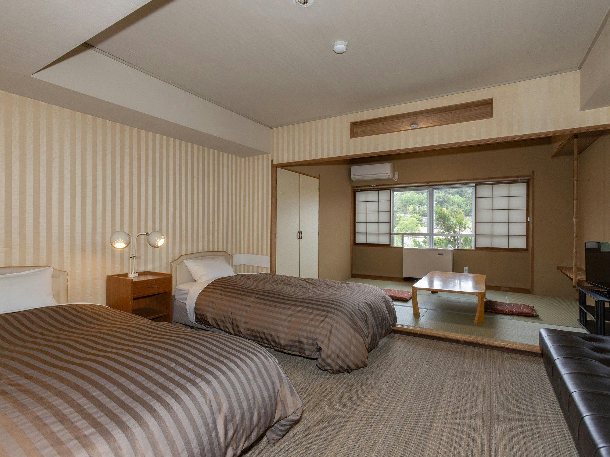 ห้องพักสไตล์ญี่ปุ่นและตะวันตก (เตียงคู่ + เสื่อทาทามิ 6 เสื่อ ตัวอย่าง)