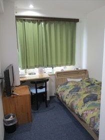 シングルアウトバスのお部屋のベッド