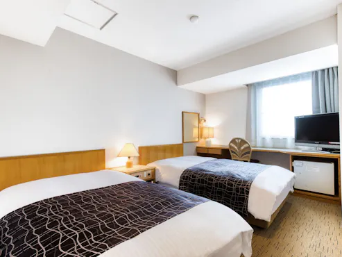 พื้นที่ 14 ตารางเมตร / เตียงกว้าง 110 ซม. × 2 เตียง