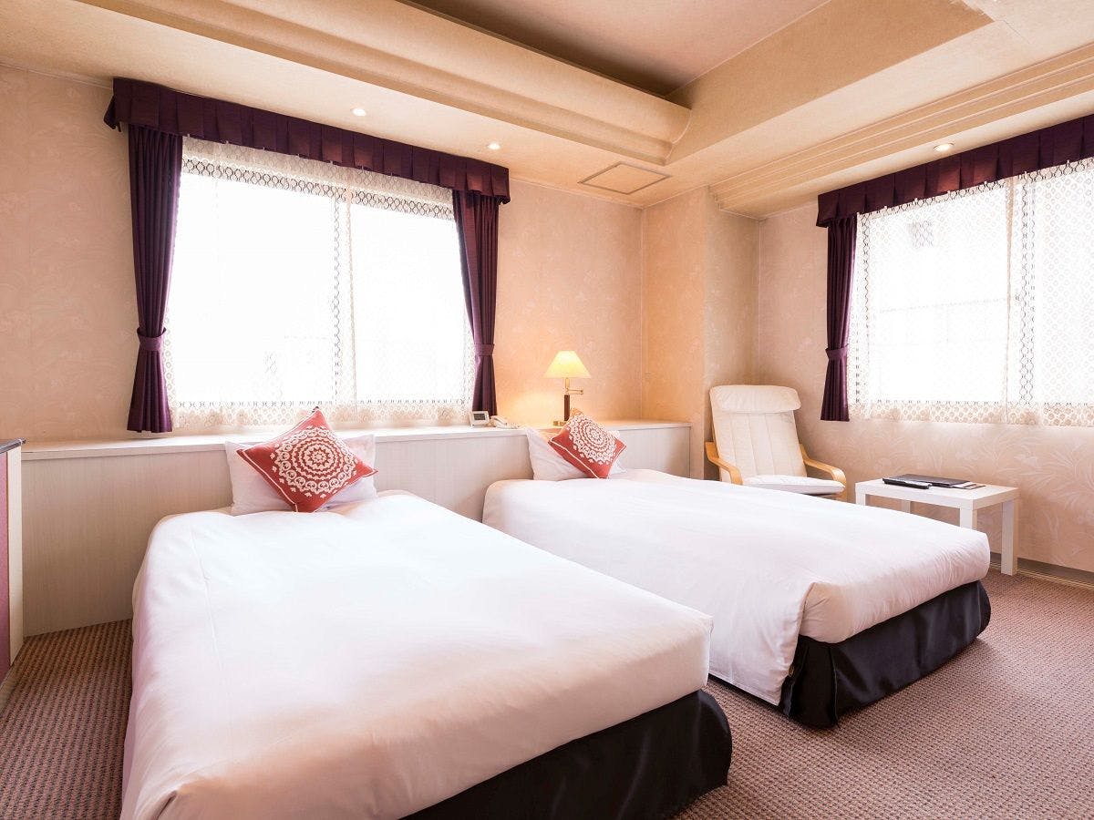 Standar Twin [Dengan Kamar Mandi dan Toilet]