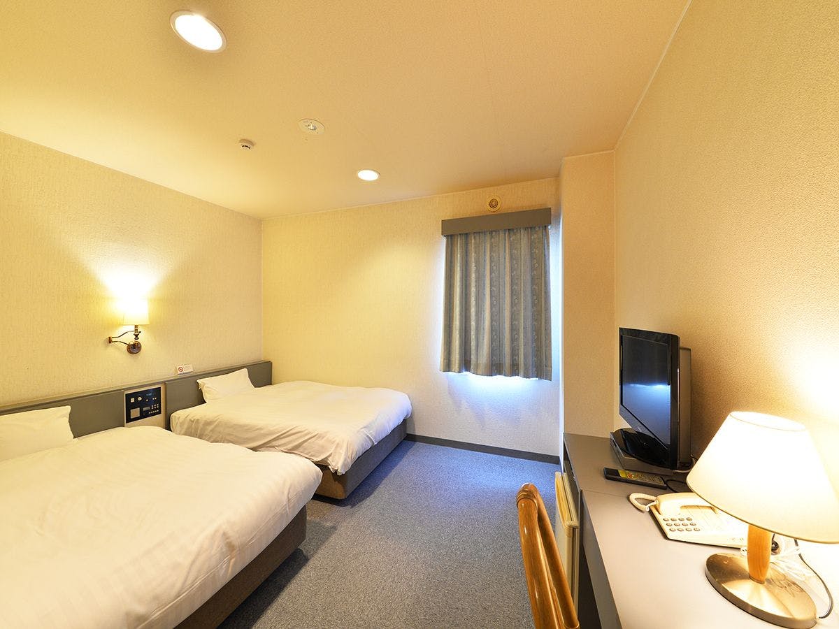 ห้องพักเตียงคู่พร้อมเตียงกึ่งคู่ขนาด 120 ซม.