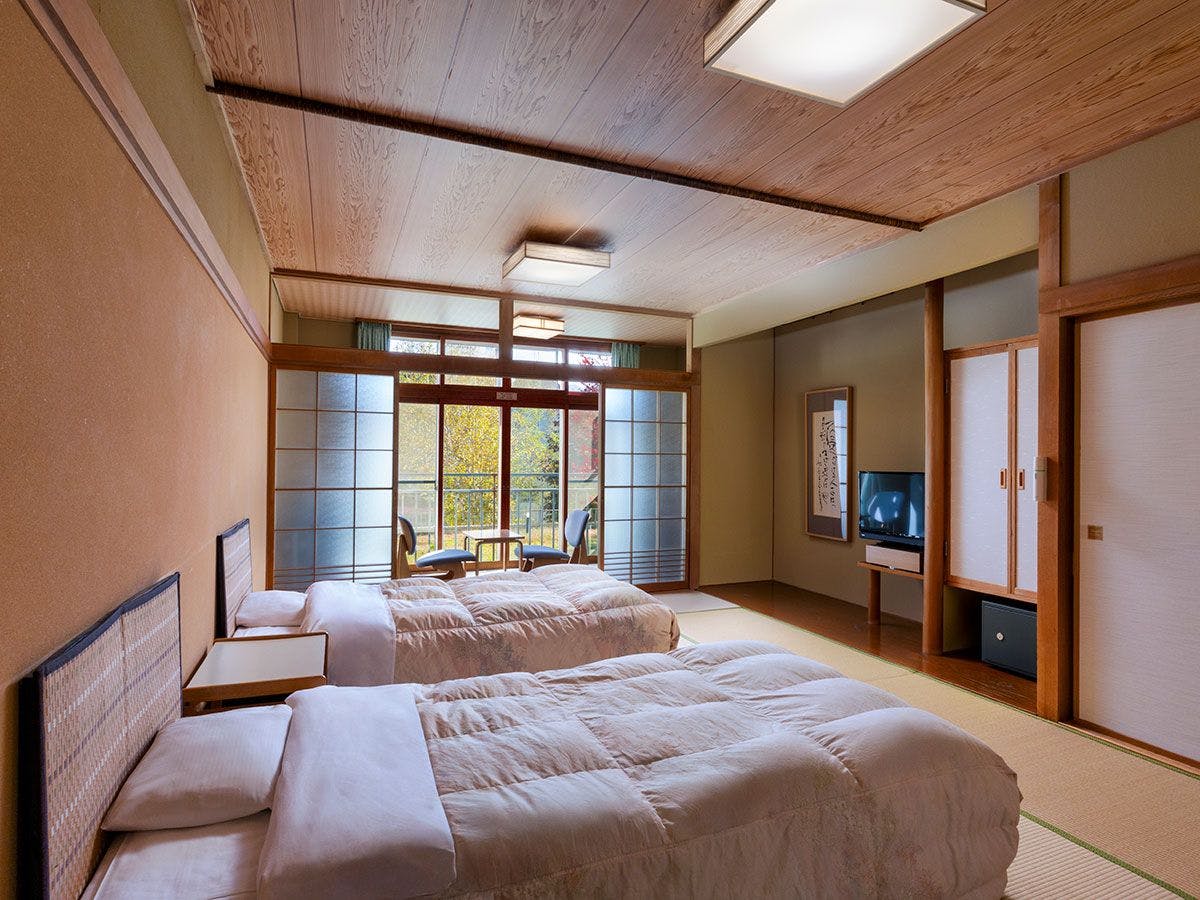 Kamar Gaya Jepang dengan Tempat Tidur