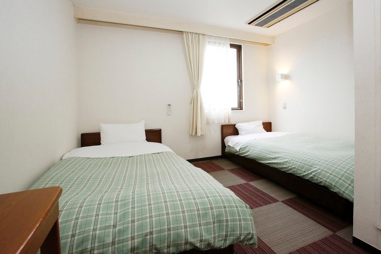 อาคารใหม่ ห้องพักสำหรับครอบครัว (ห้องสไตล์ตะวันตก + ห้องเสื่อทาทามิ 6 เสื่อ)