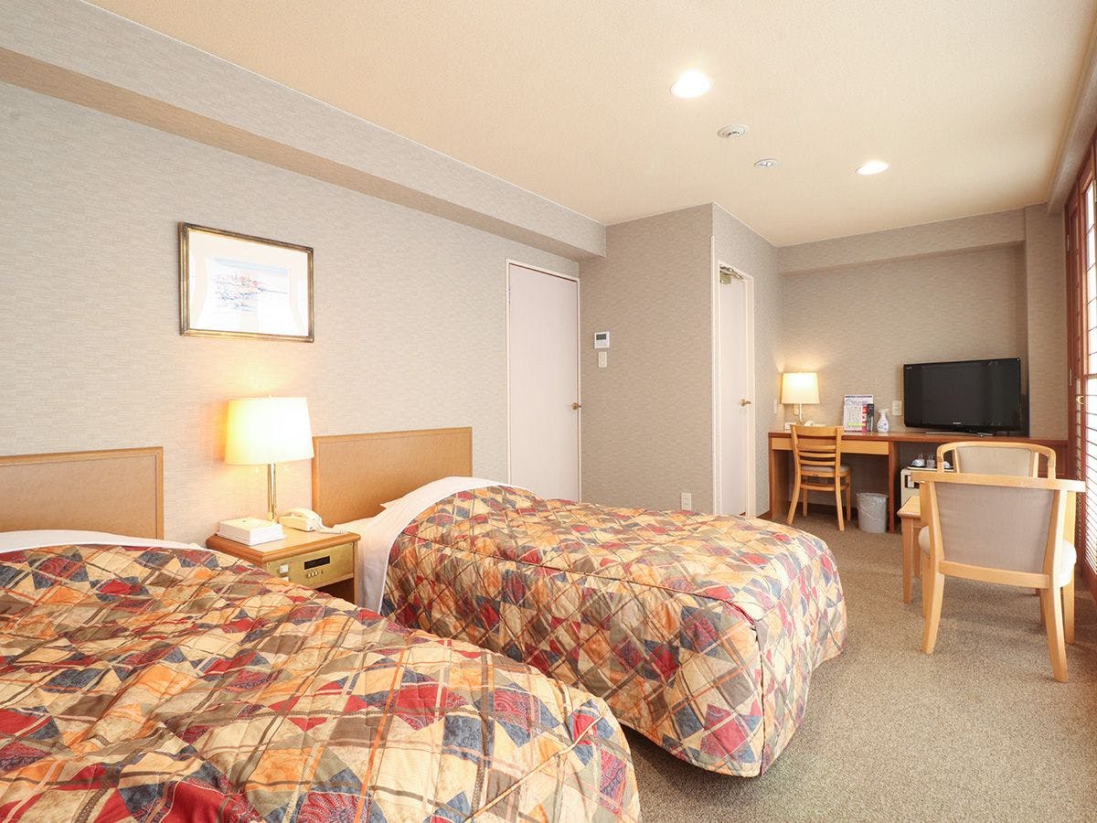 ห้องพักเตียงคู่ อาคารใหม่