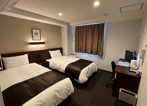 Contoh bilik berkembar