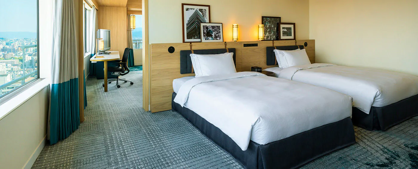 The distinctive Hakata Bay palette of white sand and green pines