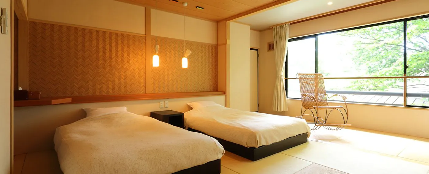 ห้องพักแบบญี่ปุ่นพร้อมเตียง