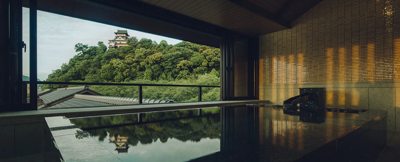 Mata air panas dan mandi