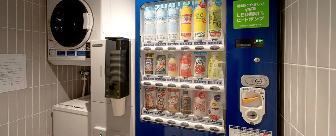 ซักรีดและตู้จำหน่ายสินค้าอัตโนมัติ