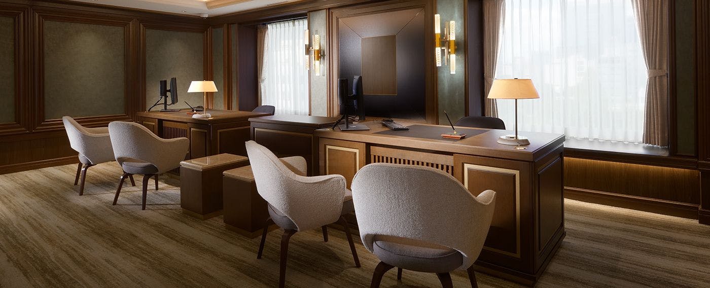 Check-in and check-out while seated on a premium sofa.