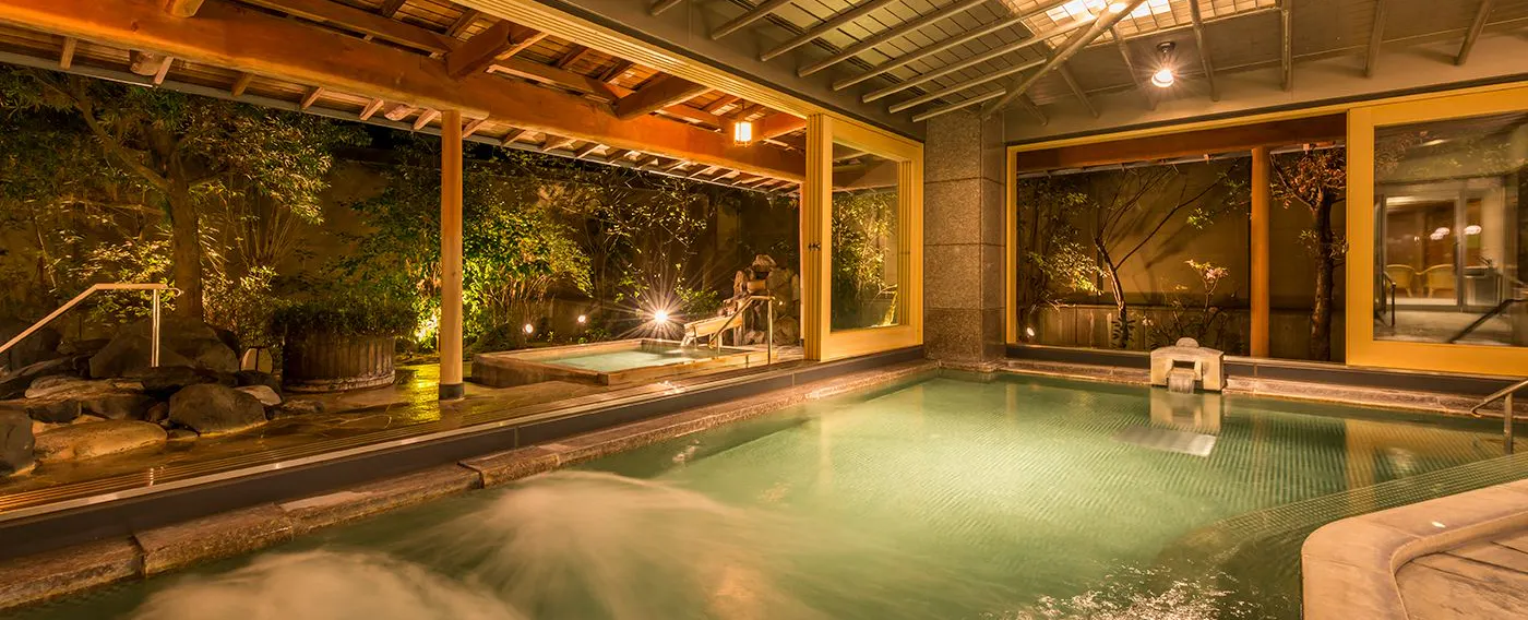 Mata air panas dan mandi