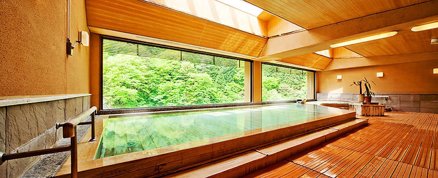 Mata air panas dan mandi