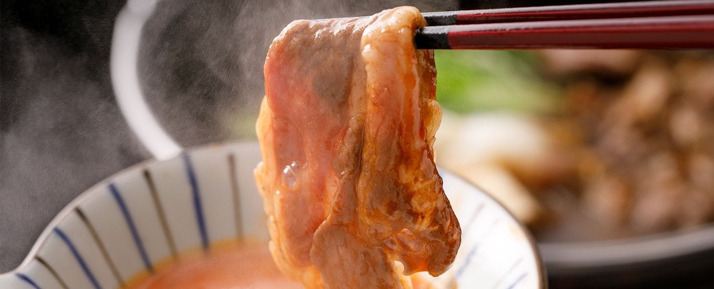 Dinner (Japanese Kaiseki) | Enjoy piping hot sukiyaki generously dipped in fresh raw egg.