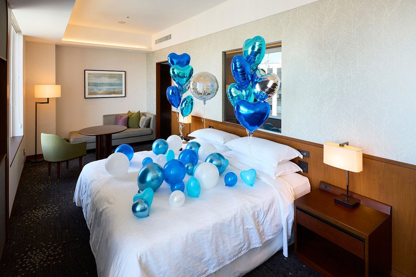 Balloon Decorations & Cake: A Surprise Celebration Stay