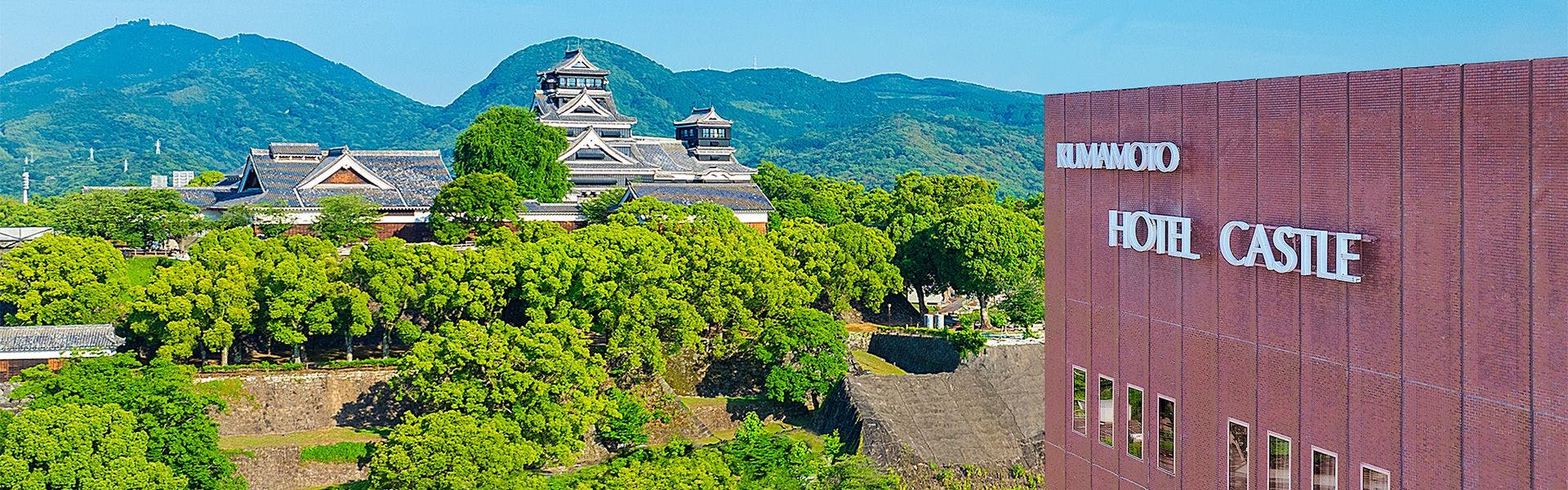 Black-lacquer donjon of Kumamoto Castle viewed from hotel