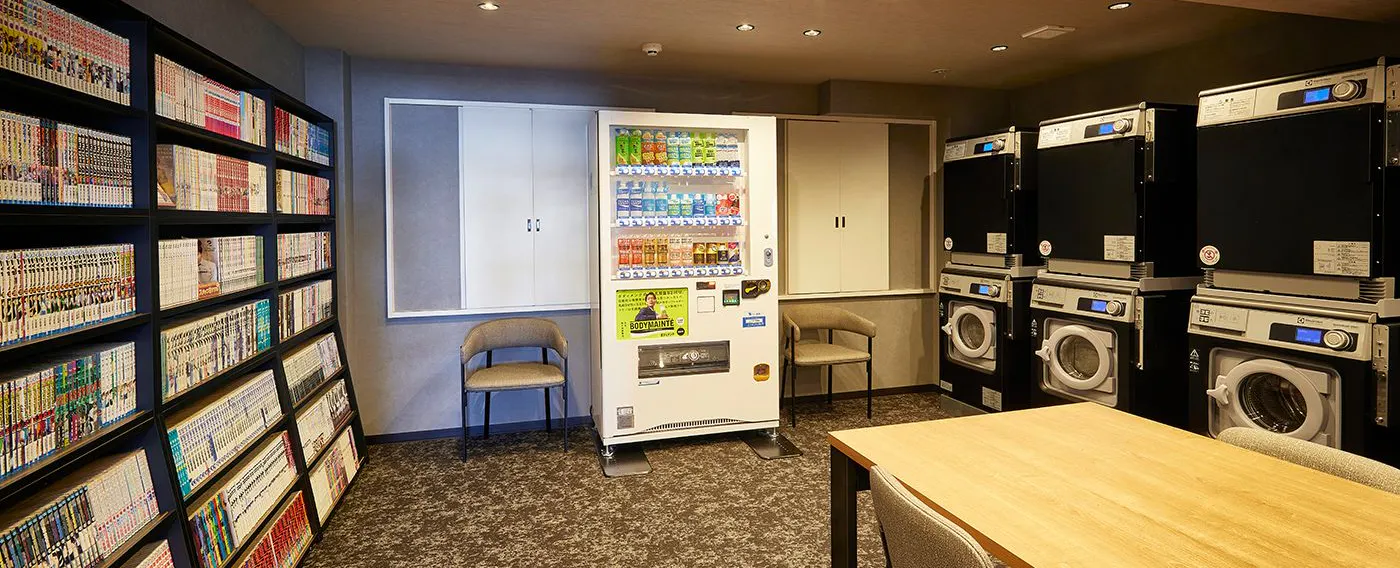 มุมหนังสือ เครื่องซักผ้าหยอดเหรียญ ตู้จำหน่ายสินค้าอัตโนมัติ