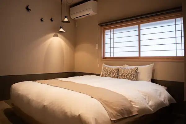 ห้องนอนของ PRIVATE MAISON KOU